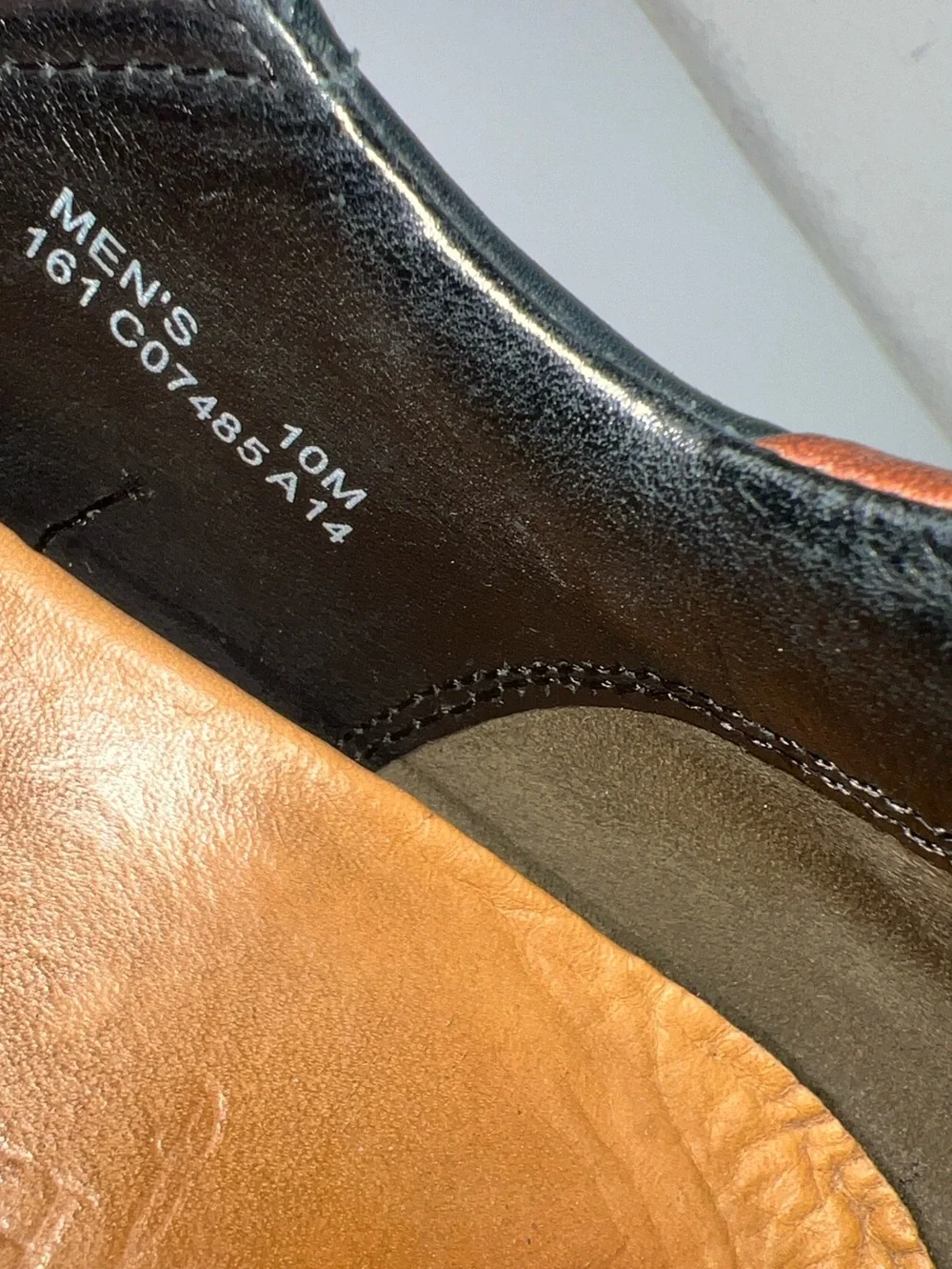 Cole Haan Black Leather Slip-On Loafers with Brown Heel Detail
